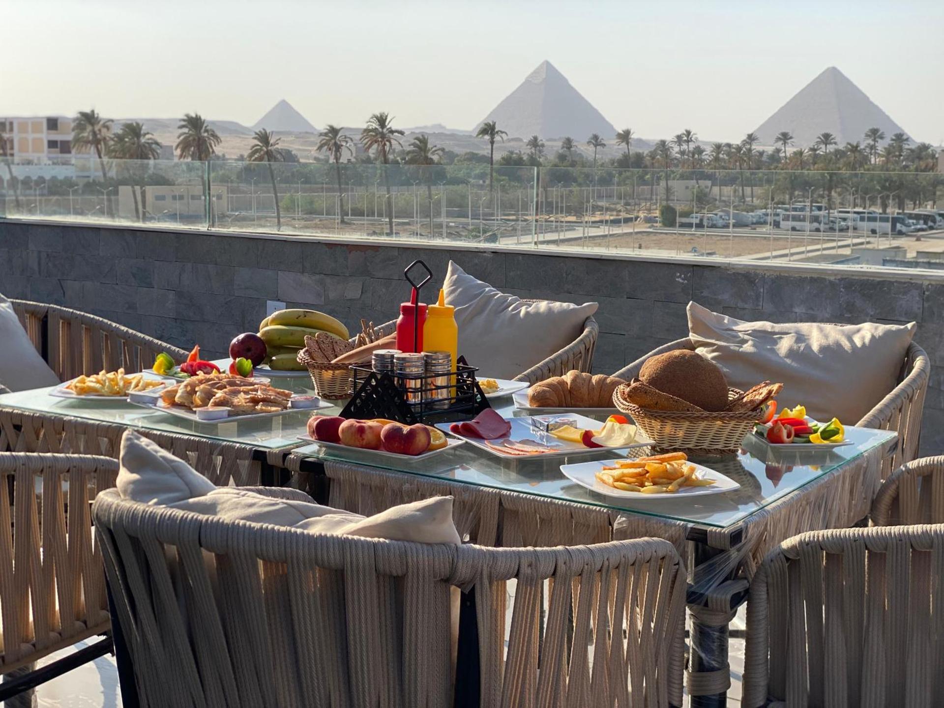 New Galleria Pyramids view inn - Photo 22