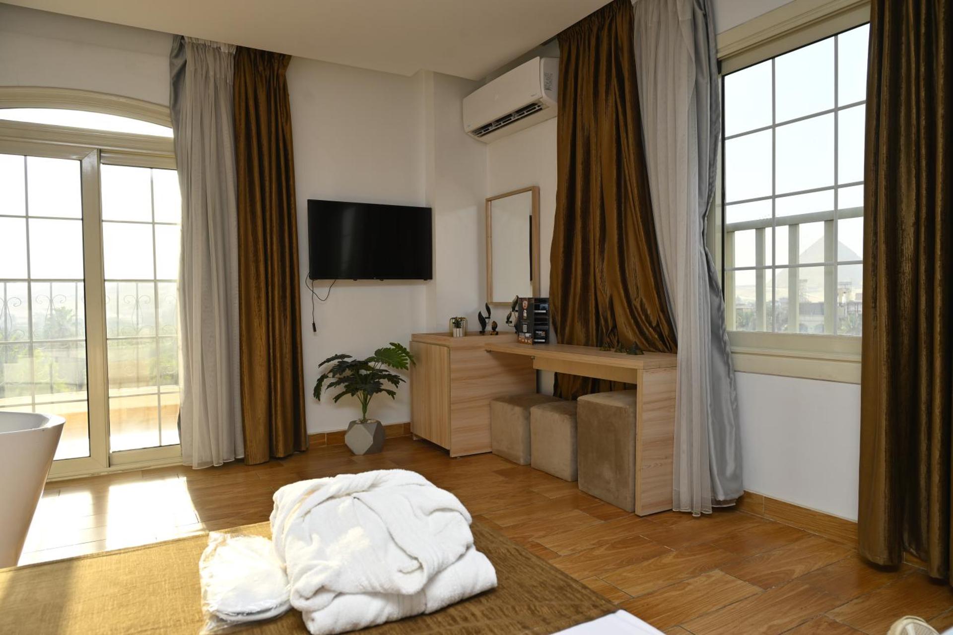 Palm Pyramids View INN - Photo 41