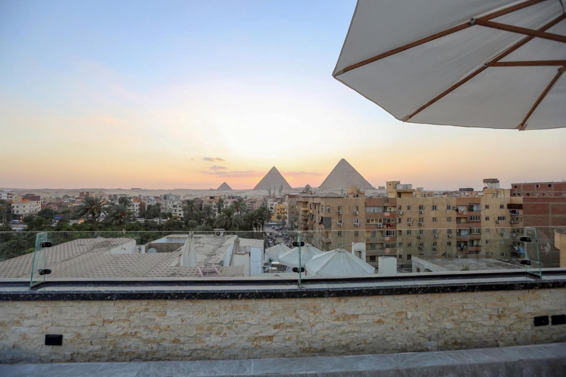 The SACRED ANGLE pyramids view - Photo 133