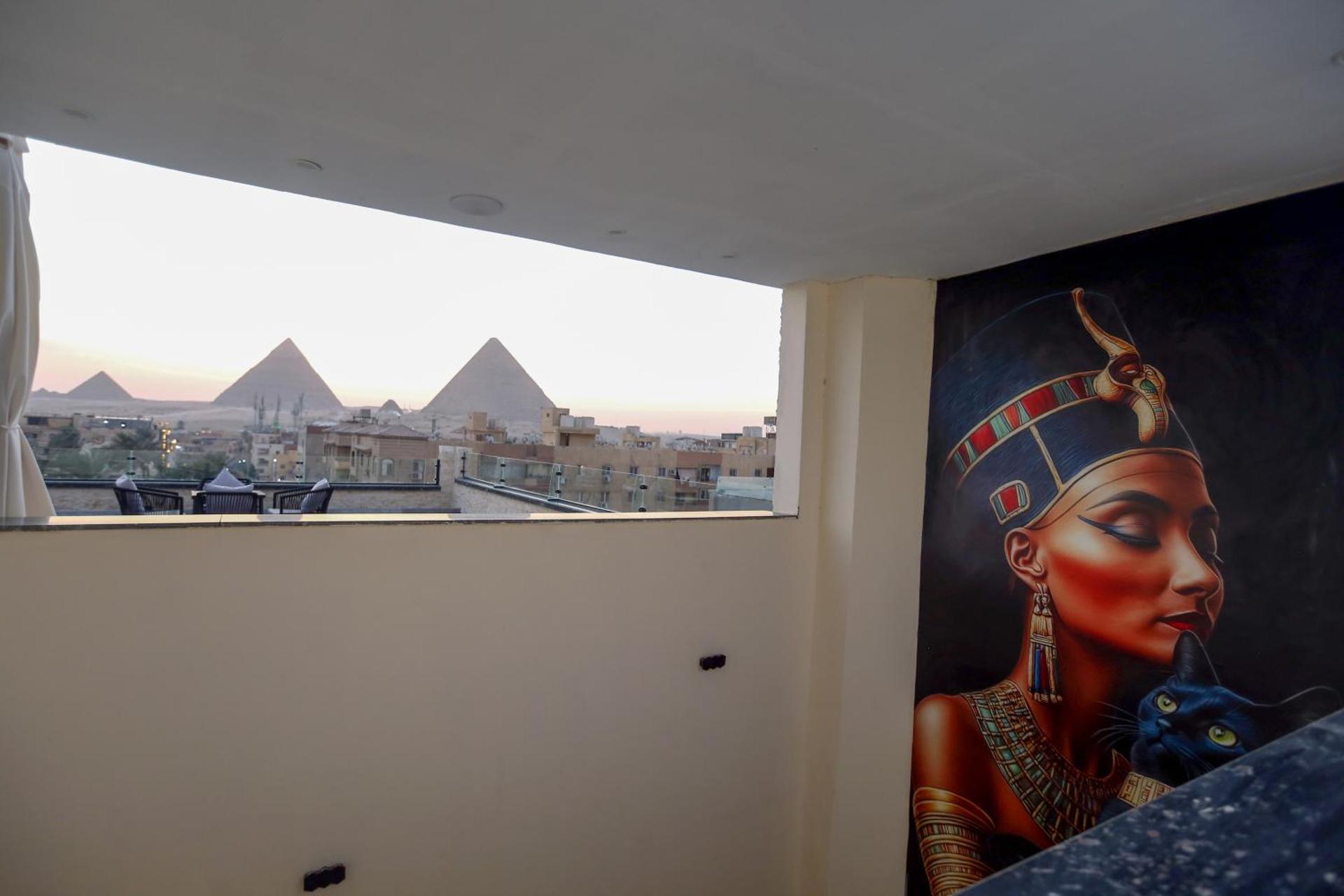 The SACRED ANGLE pyramids view - Photo 144