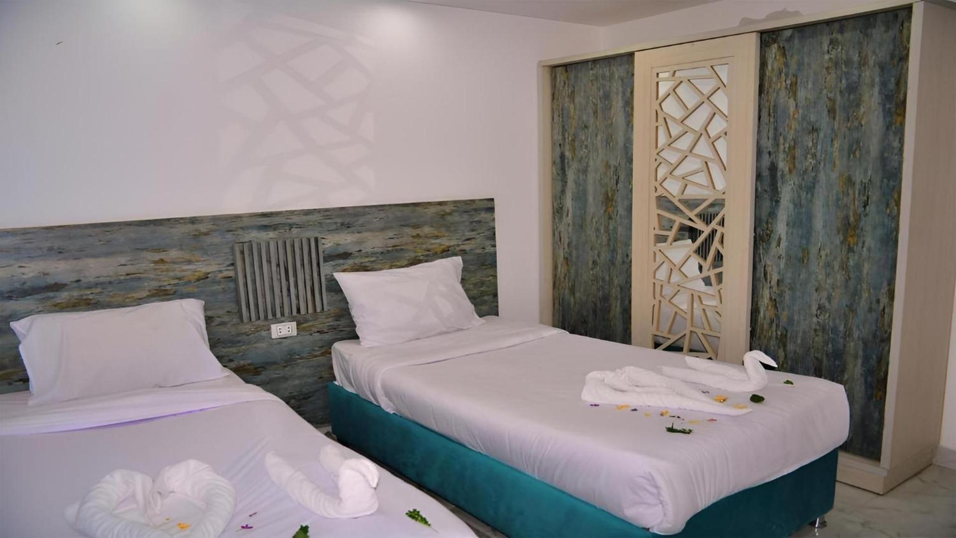 Queen T Suites All Inclusive resort - Photo 30