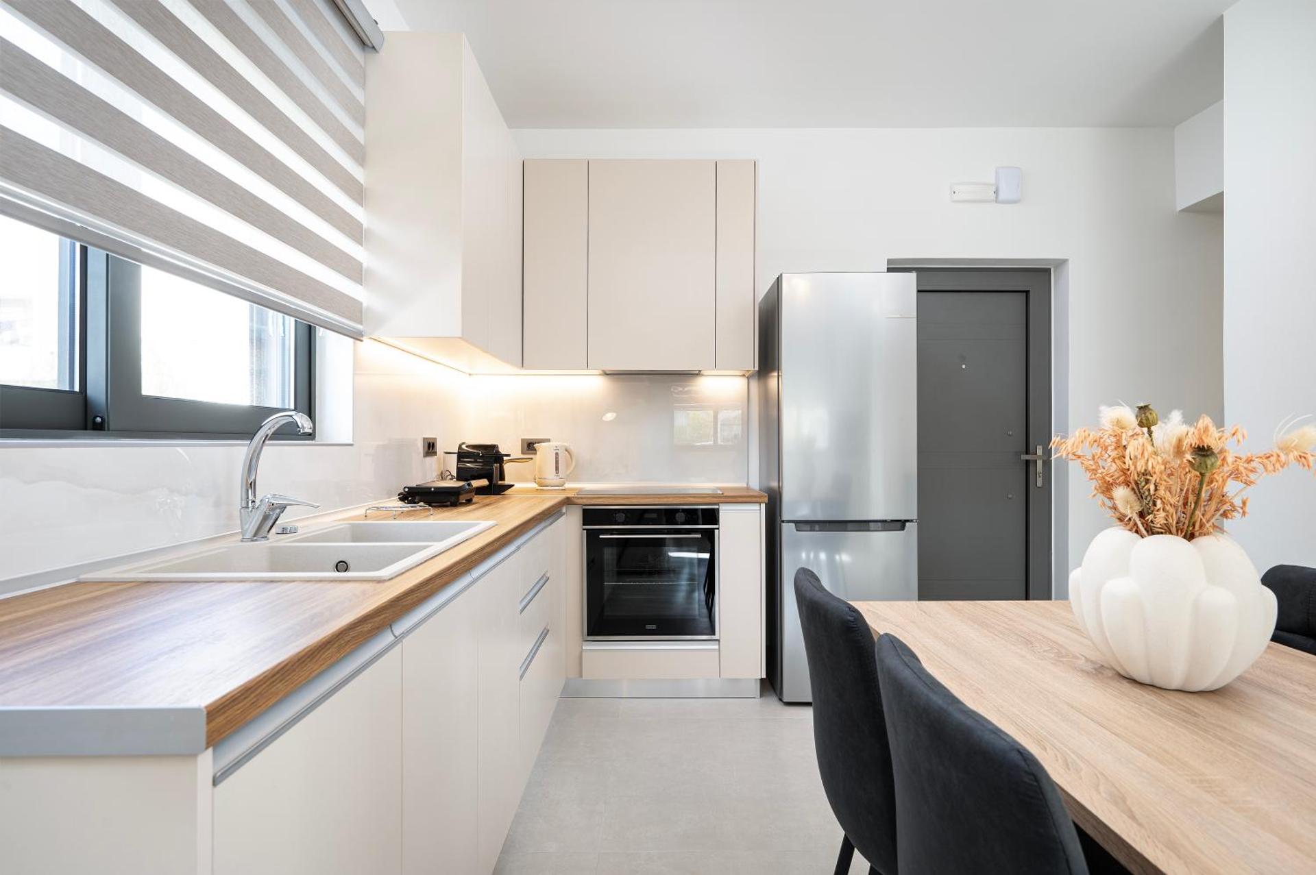 Estia Comfort Stay - Photo 16