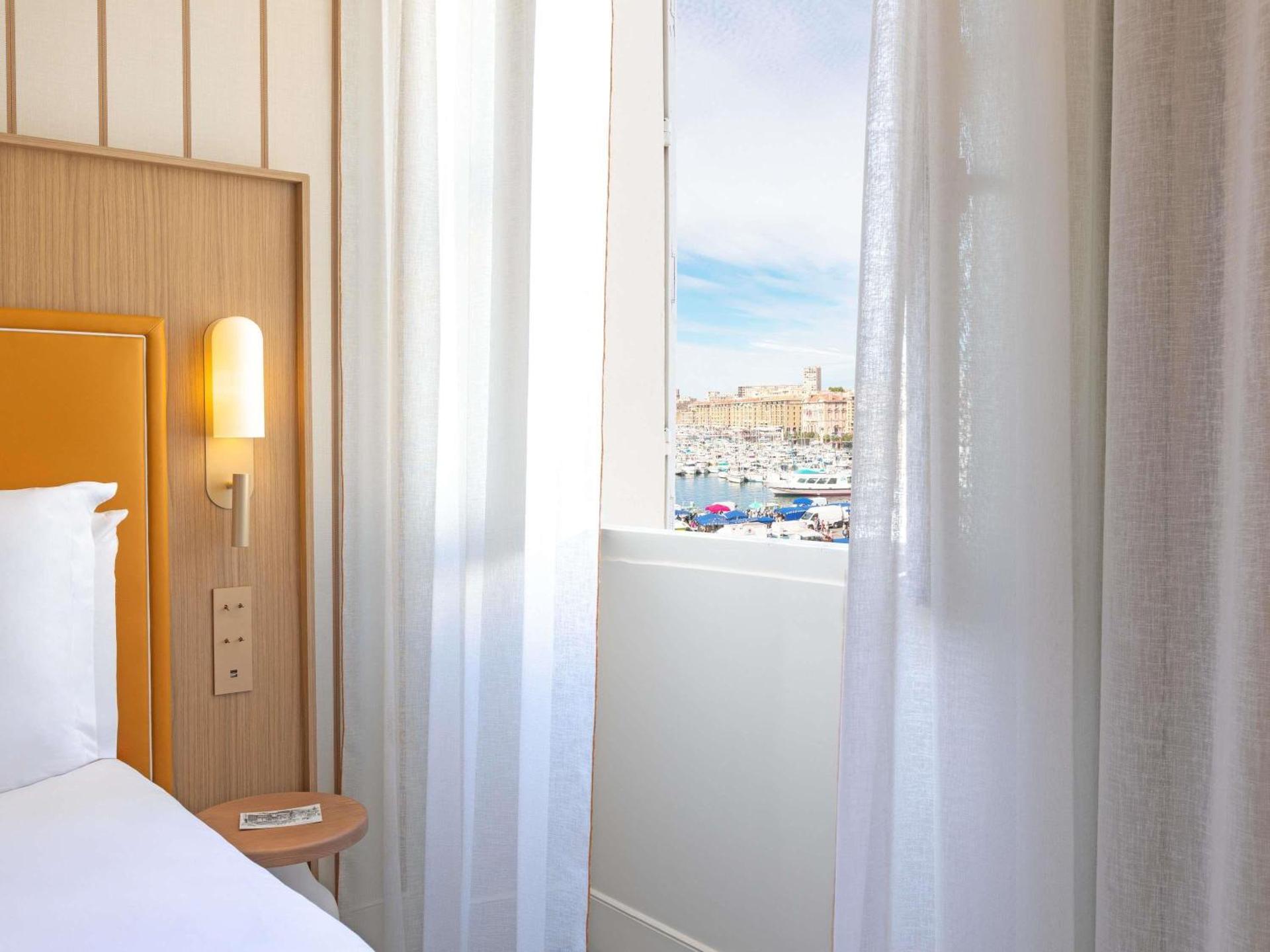 Superior Queen Room with Side Port View