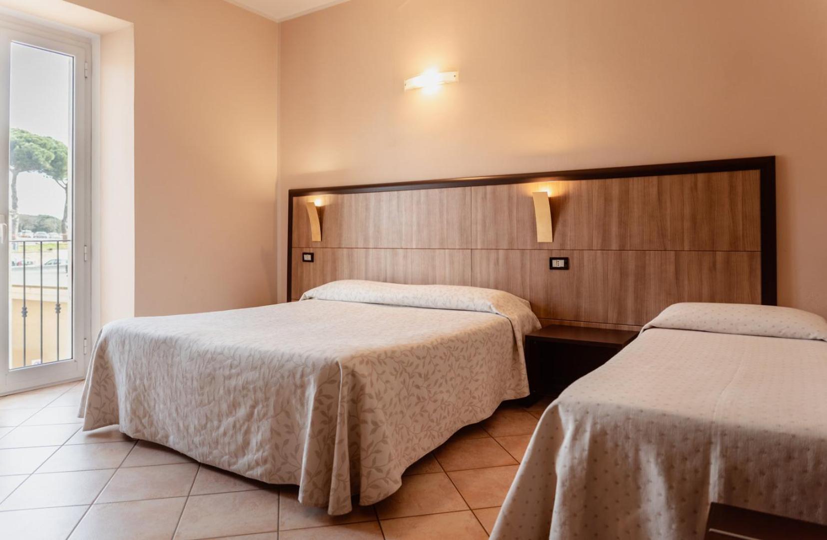 Quadruple Room (2 Adults + 2 Children)