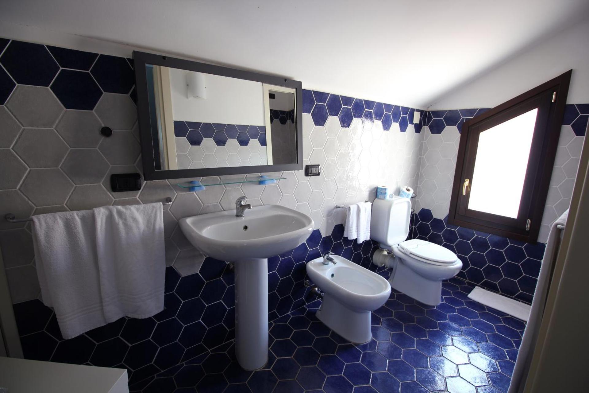 Hotel Capo Campolato - Photo 8
