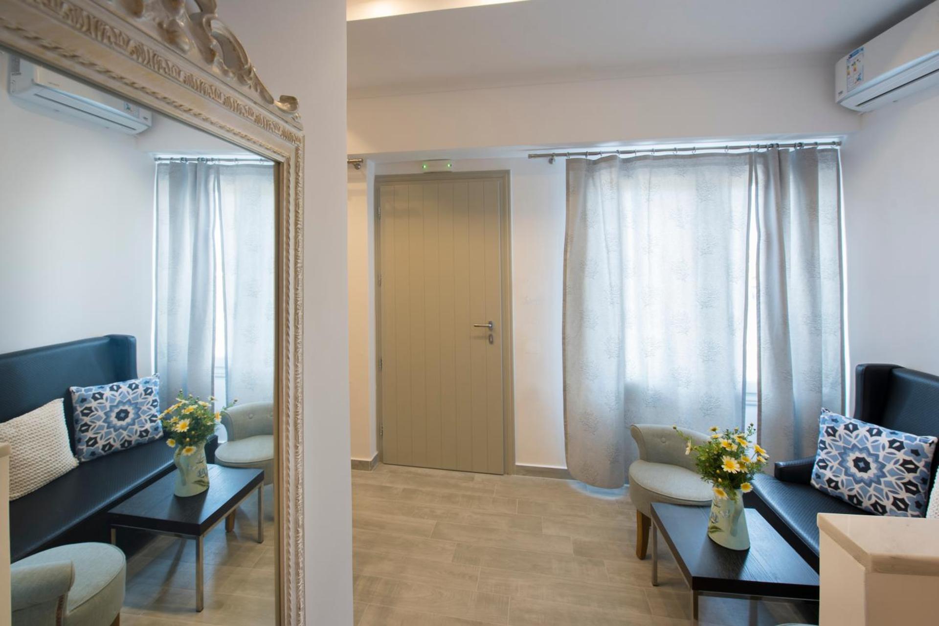 Rose Suites - Photo 18