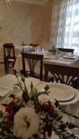 A restaurant or other place to eat at Daphnae House