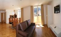 Televízia a/alebo spoločenská miestnosť v ubytovaní Apart Mountain Lodge Mayrhofen