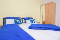 Postel nebo postele na pokoji v ubytování Apartments San Jozef