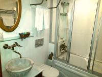 a bathroom with a sink and a shower at Merial Hotel Sultanahmet in Istanbul