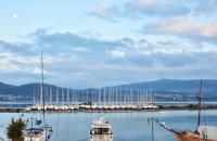 a group of boats docked in a marina on a lake at Ionion Star Hotel in Lefkada Town