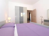 Łóżko lub łóżka w pokoju w obiekcie Apartments Mira 1293