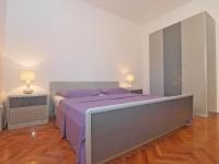 Łóżko lub łóżka w pokoju w obiekcie Apartments Mira 1293