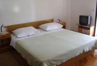 Postel nebo postele na pokoji v ubytování Apartments Radulović