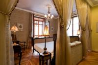 Cama o camas de una habitación en Posada Real Los Cinco Linajes