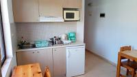 Kuchyňa alebo kuchynka v ubytovaní Kyriakos Studios