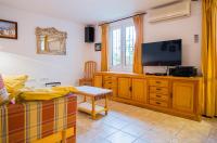 A television and/or entertainment centre at Casa Charlotte