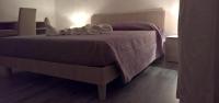 Posteľ alebo postele v izbe v ubytovaní Triathlon B&B