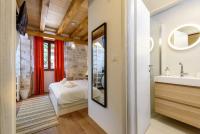 Posteľ alebo postele v izbe v ubytovaní Apartments & Rooms Tiramola - Old Town