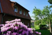 a house with purple flowers in front of it at Mansion in Bad Arolsen