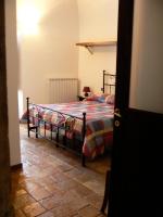 Posteľ alebo postele v izbe v ubytovaní Residence Il Palazzo