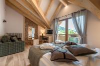 Posteľ alebo postele v izbe v ubytovaní Tevini Dolomites Charming Hotel