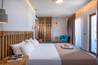 Posteľ alebo postele v izbe v ubytovaní Harma Boutique Hotel