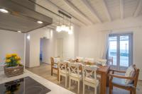 Posedenie v ubytovaní Passos Villas