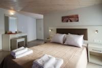 Posteľ alebo postele v izbe v ubytovaní Enali Villas