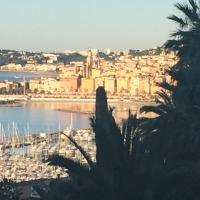a view of a city with the water and buildings at Villa Bellochio in Menton