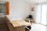 Televízia a/alebo spoločenská miestnosť v ubytovaní Apartments Gubo