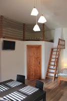 Postel nebo postele na pokoji v ubytování Apartmány Turold Mikulov