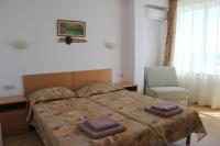 Postel nebo postele na pokoji v ubytování Hotel Radik