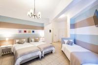 Posteľ alebo postele v izbe v ubytovaní Hotel Oasis