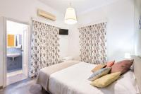 Posteľ alebo postele v izbe v ubytovaní Hotel Oasis