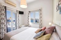 Posteľ alebo postele v izbe v ubytovaní Hotel Oasis