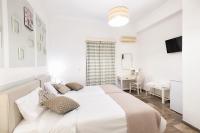 Posteľ alebo postele v izbe v ubytovaní Hotel Oasis