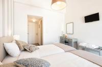 Posteľ alebo postele v izbe v ubytovaní Hotel Oasis