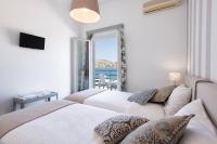 Posteľ alebo postele v izbe v ubytovaní Hotel Oasis