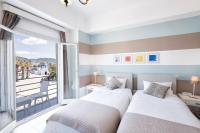 Posteľ alebo postele v izbe v ubytovaní Hotel Oasis