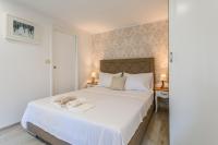 Posteľ alebo postele v izbe v ubytovaní Split Center Apartments