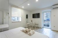 Posteľ alebo postele v izbe v ubytovaní Split Center Apartments