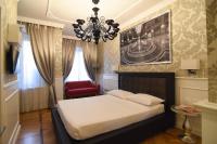 Posteľ alebo postele v izbe v ubytovaní Duomo Rooms