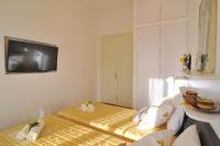 Posteľ alebo postele v izbe v ubytovaní Apartment Barbara Centrum