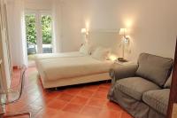 Posteľ alebo postele v izbe v ubytovaní Hotel Malaga Picasso