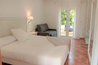 Posteľ alebo postele v izbe v ubytovaní Hotel Malaga Picasso