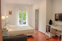 Posteľ alebo postele v izbe v ubytovaní Hotel Malaga Picasso