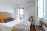 Postel nebo postele na pokoji v ubytování Casa Santa Marinha