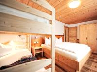 Posteľ alebo postele v izbe v ubytovaní Appartements & Chalets Wiesenruh