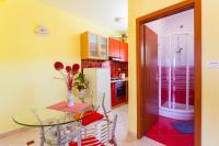 Kuchyň nebo kuchyňský kout v ubytování Apartments Marija